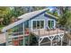 Stunning house featuring a lakeside view, modern design, and an expansive deck at 5824 N Dean Rd, Orlando, FL 32817