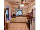Traditional kitchen with tile floor, stainless steel appliances, and pass-through to living area at 604 Tradewinds Dr, Deltona, FL 32738