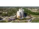 Resort featuring well-kept landscaping, beautiful design, and convenient golf cart parking at 7593 Gathering Dr # 203, Reunion, FL 34747