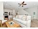 Inviting living space blends seamlessly with a modern kitchen, promoting open-concept living and dining at 8199 Coconut Pl, Kissimmee, FL 34747