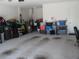 Spacious two-car garage with ample storage space and a clean, well-lit interior at 8824 Sw 104Th Cir, Ocala, FL 34481
