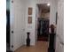 Well-organized walk-in closet with ample hanging space and shelving for efficient clothing storage solutions at 8824 Sw 104Th Cir, Ocala, FL 34481