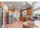 Traditional kitchen featuring stainless steel appliances, custom cabinetry, and granite countertops at 437 Wilmington Cir, Oviedo, FL 32765