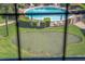 Community with a beautiful pool, lush green landscaping, and a putting green for recreational enjoyment at 100 S Interlachen Ave # 503, Winter Park, FL 32789