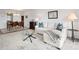 Comfortable living room leads into the dining room and features a large sofa with natural light at 100 S Interlachen Ave # 503, Winter Park, FL 32789