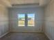 A bedroom with two windows at 1013 Alabaster Way, Deltona, FL 32725