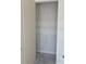A standard closet with white trim and walls at 1013 Alabaster Way, Deltona, FL 32725