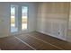 A view of an unfinished room featuring a sliding glass door to the outside at 1013 Alabaster Way, Deltona, FL 32725