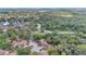 Aerial view showcasing the property's location surrounded by lush greenery at 122 Spreading Oak Ct, Sanford, FL 32773