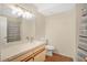 Bathroom features vanity with stone countertop and shower/tub combo at 122 Spreading Oak Ct, Sanford, FL 32773