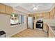 Bright kitchen featuring stainless steel appliances and tile floors at 122 Spreading Oak Ct, Sanford, FL 32773