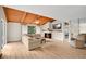 Cozy living room featuring a fireplace, wood ceiling and plush sofa at 122 Spreading Oak Ct, Sanford, FL 32773