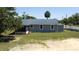 Charming single-story home featuring a new roof, light gray siding, and a screened-in porch at 1350 Martin Luther King Jr Blvd, Bartow, FL 33830