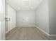 Spacious room with modern wood flooring, recessed lighting, and utility hookups, ready for versatile use at 1350 Martin Luther King Jr Blvd, Bartow, FL 33830