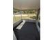 Inviting screened-in porch that offers a cozy outdoor space, perfect for enjoying the surrounding greenery at 1350 Martin Luther King Jr Blvd, Bartow, FL 33830