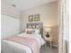 Comfortable bedroom with neutral walls, has a queen bed and decor at 1355 Wood Line Loop, Deland, FL 32720