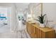 Bright entryway featuring a console table, decor, and a view into the open-concept living area at 1355 Wood Line Loop, Deland, FL 32720