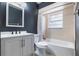 This bathroom features a large vanity with a combination shower and tub at 1510 Chatsworth Ave, Deltona, FL 32738