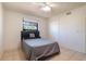 This bedroom features neutral walls, and an updated ceiling fan at 1510 Chatsworth Ave, Deltona, FL 32738