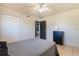 This bedroom features neutral walls, updated ceiling fan, and a walk-in closet at 1510 Chatsworth Ave, Deltona, FL 32738