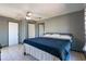 Bedroom with tile floors, ceiling fan, and two closets at 1510 Chatsworth Ave, Deltona, FL 32738