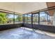 Spacious screened-in patio offering a versatile outdoor living area at 1510 Chatsworth Ave, Deltona, FL 32738