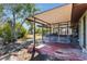Enclosed patio area with lots of space and partial cover from the elements at 1510 Chatsworth Ave, Deltona, FL 32738
