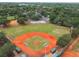 Aerial view of a well-maintained baseball field with open green spaces at 1514 Pelican St, Longwood, FL 32750