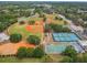 Aerial view of a park offering baseball fields, tennis courts, and recreational facilities at 1514 Pelican St, Longwood, FL 32750