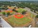 Aerial view of a park with multiple baseball fields and recreational areas at 1514 Pelican St, Longwood, FL 32750