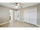 Bedroom with ensuite bathroom and large closet with bi-fold doors at 1514 Pelican St, Longwood, FL 32750