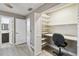 Office nook inside of a closet with built-in desk and shelving at 1514 Pelican St, Longwood, FL 32750