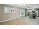 Dining room with open floor plan, view of kitchen, and lots of natural light at 1514 Pelican St, Longwood, FL 32750