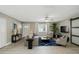 Living room featuring modern decor, a comfortable seating area, and a bright, airy atmosphere at 1514 Pelican St, Longwood, FL 32750