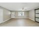 Spacious living room with lots of natural light and wood look flooring at 1514 Pelican St, Longwood, FL 32750