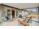 Charming screened porch with comfortable seating, access to the backyard, and seamless flow to the interior at 1514 Pelican St, Longwood, FL 32750