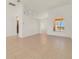 Spacious living room with tile flooring, offering ample room for entertaining and a view to the exterior at 1521 Gants Cir, Kissimmee, FL 34744