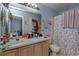 Bathroom featuring double sinks and a shower/tub combo at 15279 Sugargrove Way, Orlando, FL 32828