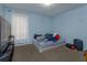 View of bedroom with carpet floors and lots of light at 15279 Sugargrove Way, Orlando, FL 32828