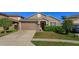 Charming single-story home with well-maintained lawn and two-car garage at 15279 Sugargrove Way, Orlando, FL 32828