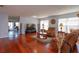 Hardwood living room with comfortable seating and open, airy feel with lots of natural light at 15279 Sugargrove Way, Orlando, FL 32828