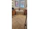 Relaxing primary bathroom featuring a large soaking tub, tile floors, and a window for natural light at 1530 Lexington Av Ave, Davenport, FL 33837