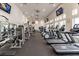 Well-equipped fitness center with treadmills, weight machines, and multiple TVs for an active lifestyle at 1530 Lexington Av Ave, Davenport, FL 33837
