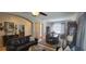 Comfortable living room with a ceiling fan, archways, and a view of the entryway at 1530 Lexington Av Ave, Davenport, FL 33837
