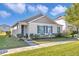 Charming single-story home with well-maintained landscaping and inviting curb appeal at 1932 Red Canyon Dr, Kissimmee, FL 34744