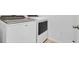 Laundry area featuring new, white Whirlpool washer and dryer appliances at 1932 Red Canyon Dr, Kissimmee, FL 34744