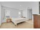 Bright main bedroom with carpet flooring, two windows and neutral color scheme at 1932 Red Canyon Dr, Kissimmee, FL 34744