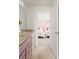 Hallway view of the sink and the bedroom beyond at 2320 Lelani Cir, Davenport, FL 33897