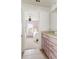 Hallway view of the vanity with the bedroom beyond at 2320 Lelani Cir, Davenport, FL 33897