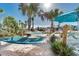 Multiple hammocks sit in the shade to keep guests cool and comfortable at 2320 Lelani Cir, Davenport, FL 33897